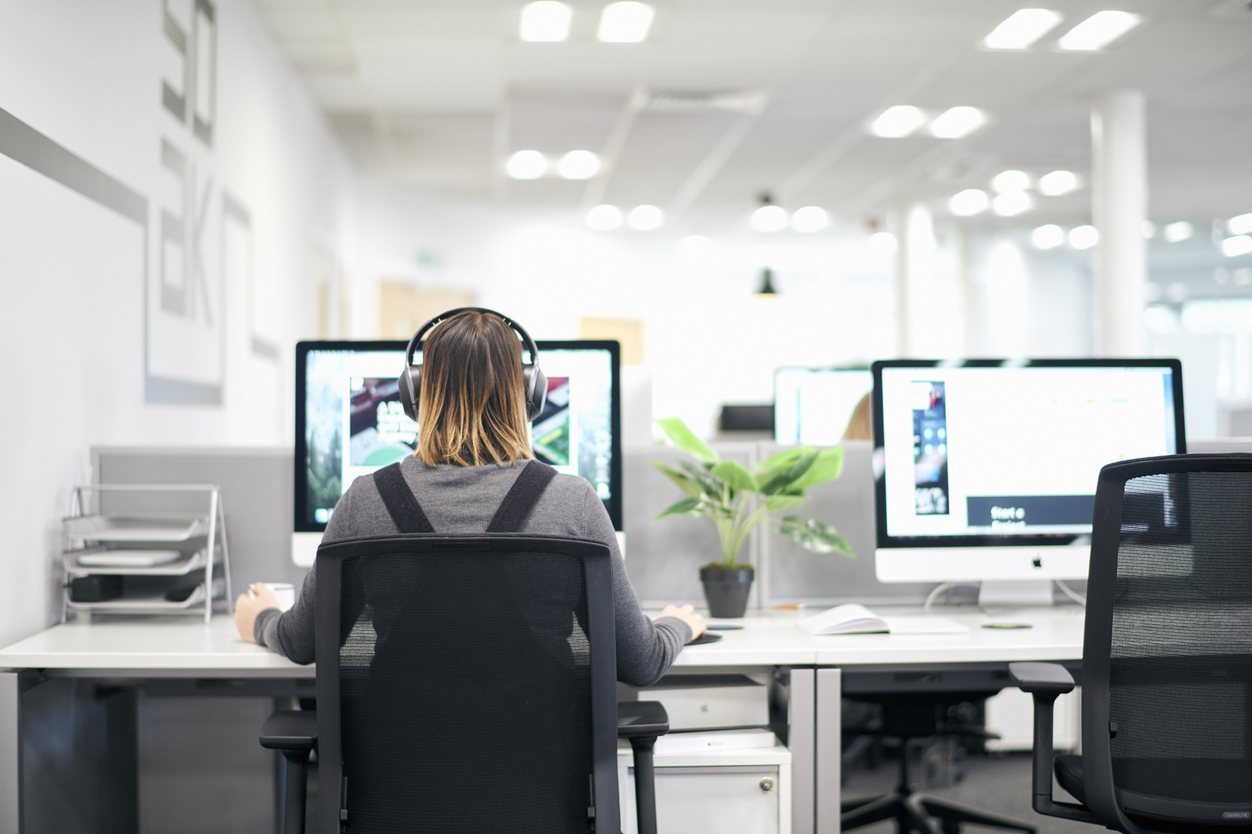 Female designer working at desk